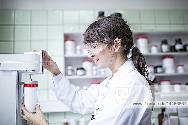Woman working in laboratory of a pharmacy