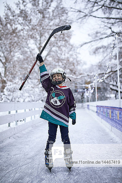 Portrait of a boy in ice hockey gear