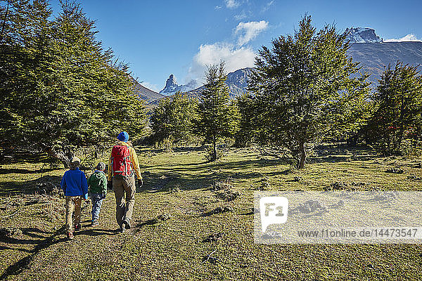 Chile  Cerro Castillo  mother with two sons on a hiking trip