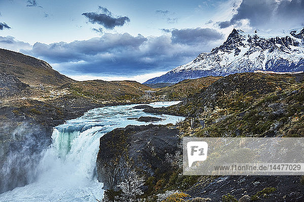 Chile Torres del Paine National park Cascada del Rio Paine Salto Grande Waterfall in front of Torres del Paine massif