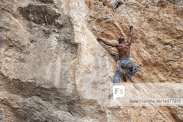 Greece  Kalymnos  climber in rock wall