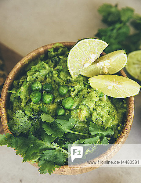 Guacomole with peas  avocado  lime and coriander