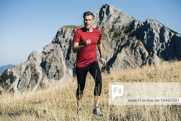 Austria  Tyrol  man running in the mountains