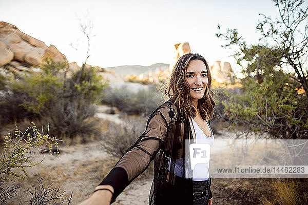 USA  California  Los Angeles  portrait of smiling woman in Joshua Tree National Park