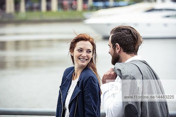 Smiling couple walking outdoors