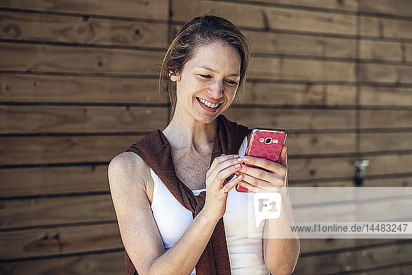 Mature woman using smart phone