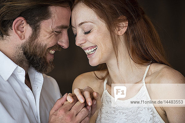 Close-up of couple touching heads