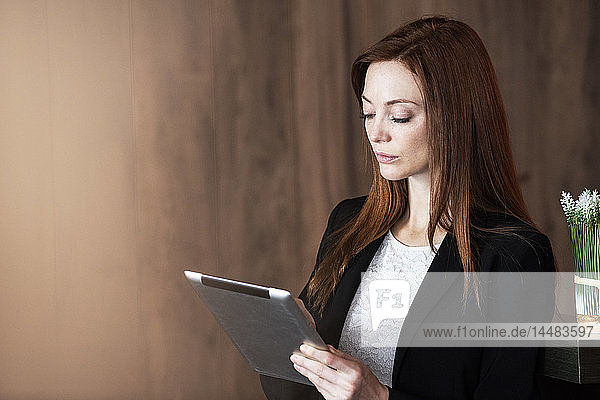 Businesswoman using digital tablet