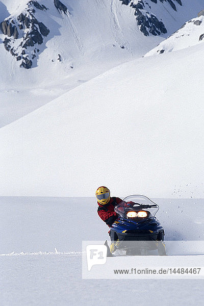 Person on Snowmachine Alaska Range Interior Winter AK