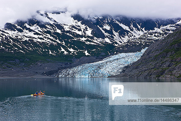 Family kayaking in Shoup Bay with Shoup Glacier in the background  Prince William Sound  Southcentral Alaska