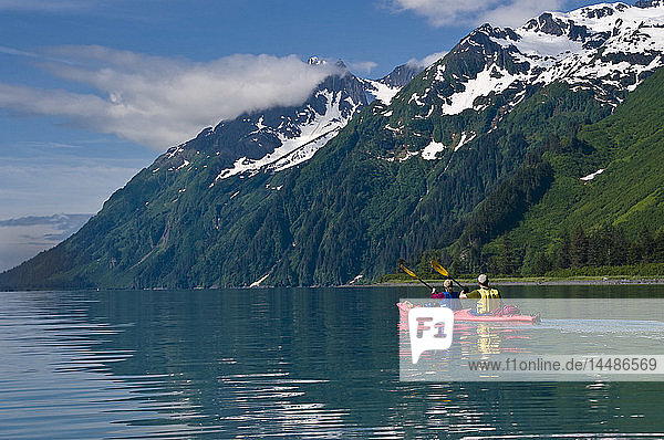 Couple kayaking in Shoup Bay  Prince WIlliam Sound  Southcentral Alaska