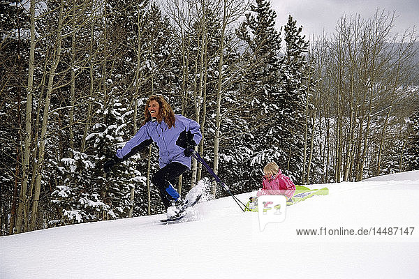 Mother & Daughter Snowshoeing Colorado Winter