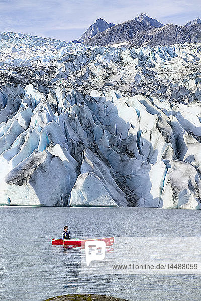 Canoeist on Mendenhall Lake SE Alaska Summer Tongass NF near Mendenhall Glacier