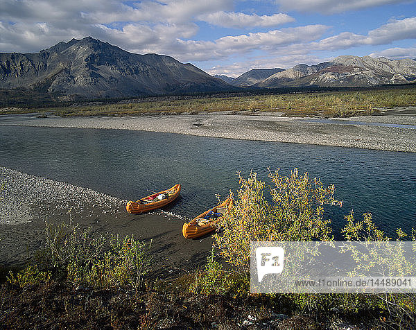 Canoes on shore East Fork Chandalar River ANWR AK Arctic summer scenic