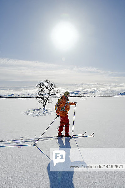 Woman hiking on snow