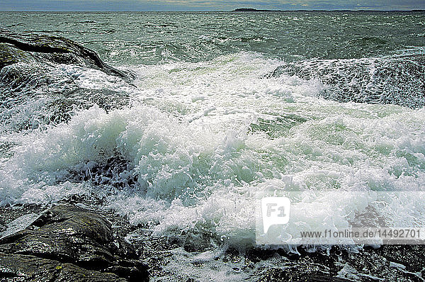 Surf on rocks at coast