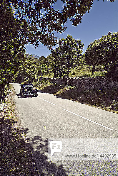Vintage car on road