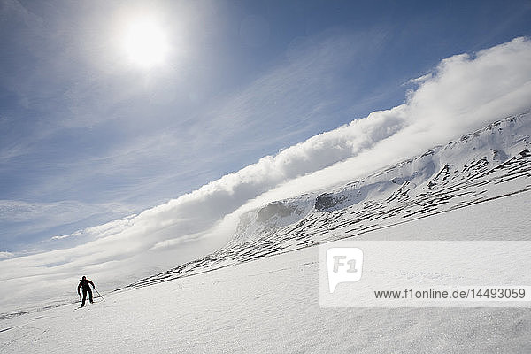 Person skiing on snow covered slope