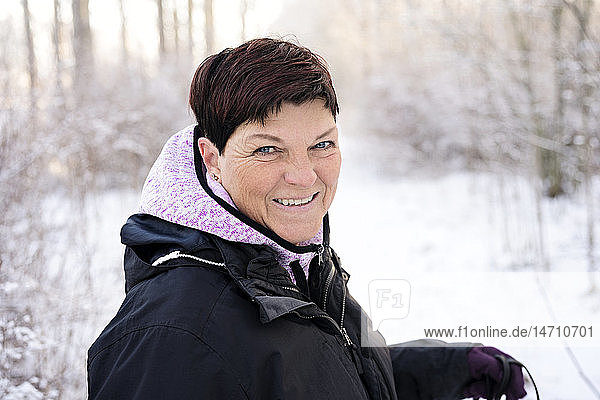 Smiling woman at winter