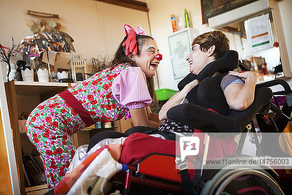 Reportage on two clowns who are part of the Hopiclowns association. They perform in a home for disabled adults in Geneva  Switzerland.