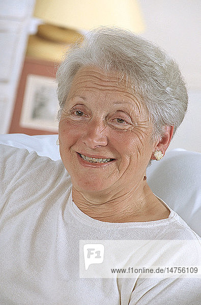 PORTRAIT OF -65 YR-OLD WOMAN