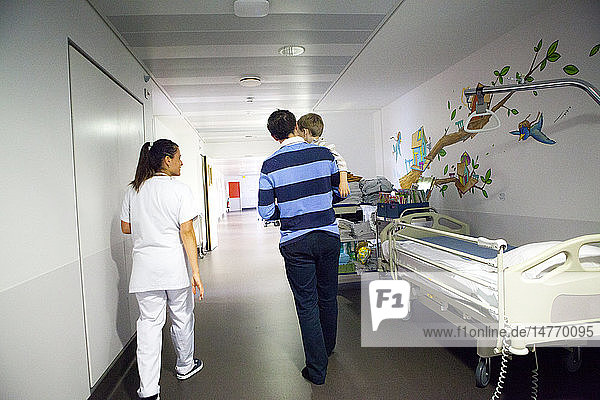 Reportage in the pediatric emergency unit in a hospital in Haute-Savoie  France. A nurse accompanies a father and his son.