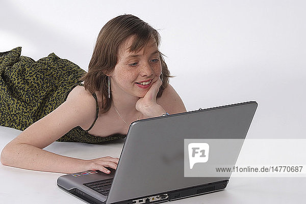 TEENAGER AT A COMPUTER