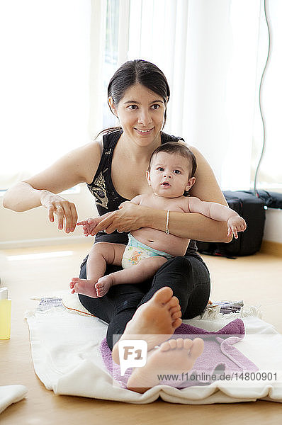 Infant being massaged