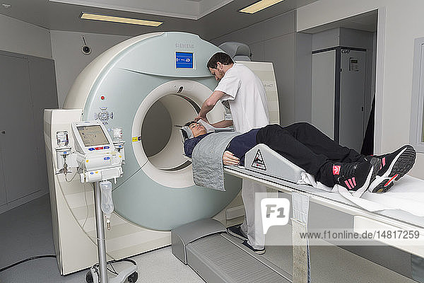 Reportage on PET imaging at the Antoine-Lacassagne Cancer centre in Nice  France. Positron Emission Tomography  or PET scan  is used in diagnosing and monitoring patients with cancer. This method enables tumours to be detected using a radioactive tracer  which accumulates heavily in cells that present a pathological hypermetabolism.