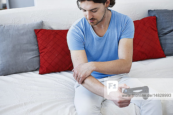 Man with painful elbow