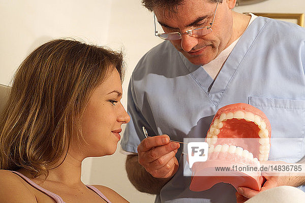 WOMAN RECEIVING DENTAL CARE