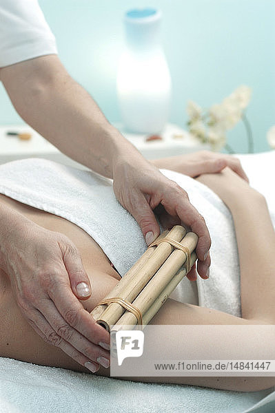 WOMAN BEING MASSAGED