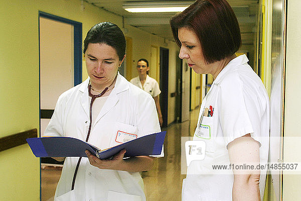 DOCTOR WITH MEDICAL RECORD
