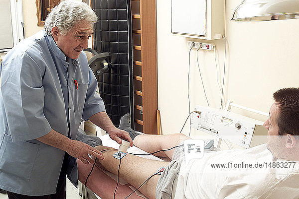 MAN IN PHYSICAL THERAPY