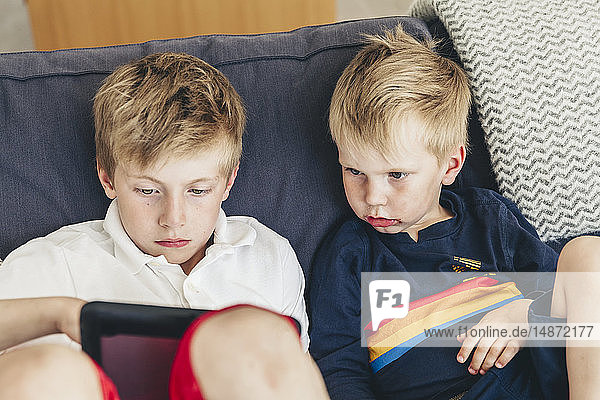 Boys with digital tablet