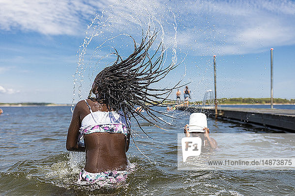 Girls playing in sea