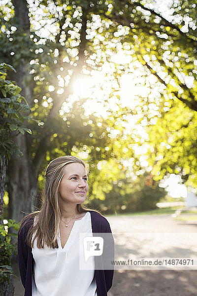 Smiling woman looking away