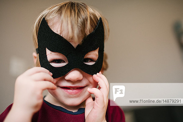 Boy in costume mask