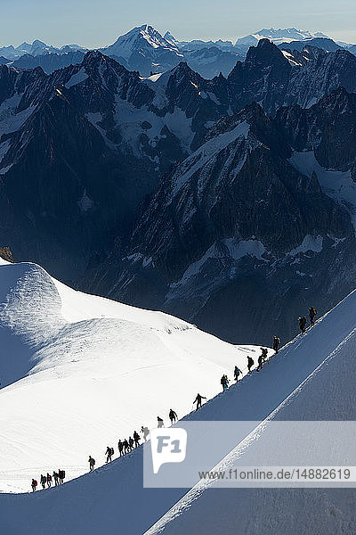 Mountain climbers on descent in distance  Chamonix  Rhone-Alps  France