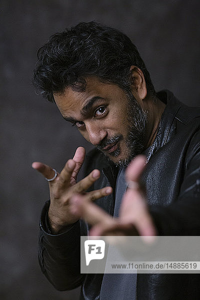 Portrait of an Indian magician  gesturing