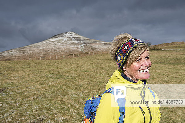 United Kingdom  Brecon Beacons National Park  Sugar Loaf  smiling female mature hiker