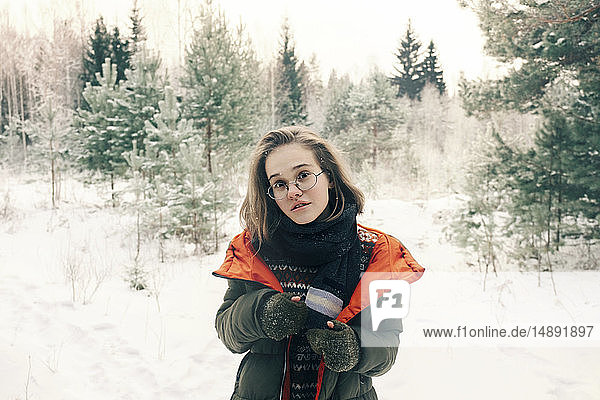Teenage girl with glasses during winter