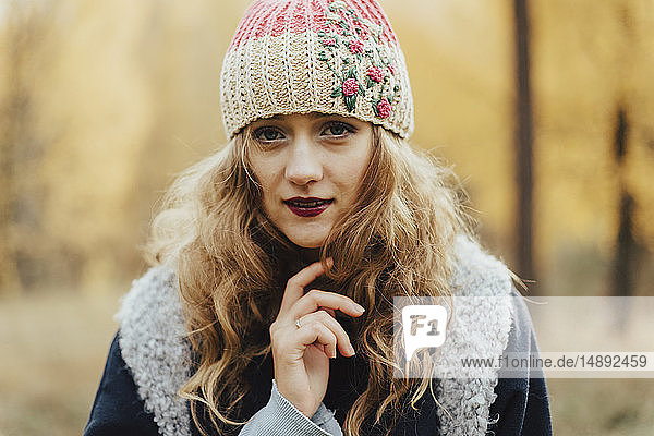 Young woman in floral pattern woolen hat