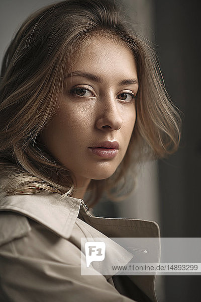Portrait of young woman wearing natural make-up