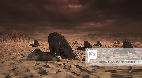 Businessmen hiding their heads in the sand composite image