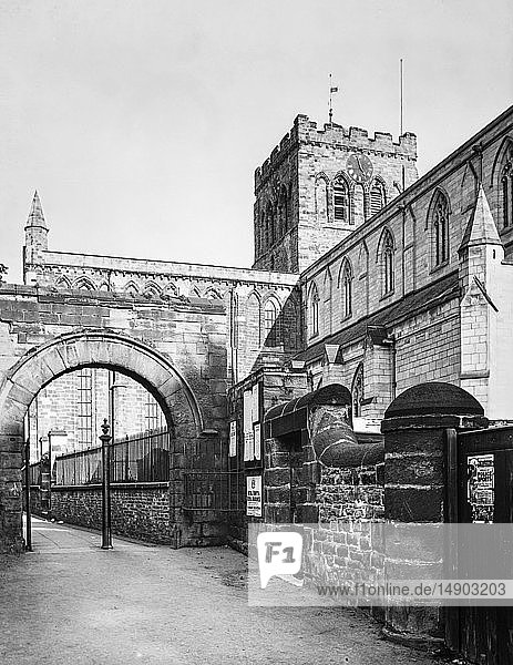 A magic lantern slide circa 1900. Religious slides . Hexham Abbey is a place of Christian worship dedicated to St Andrew located in the town of Hexham  Northumberland  in northeast England. Originally built in AD 674  the Abbey was built up during the 12th Century into its current form  with additions around the turn of the 20th Century. Since the Dissolution of the Monasteries in 1537  the Abbey has been the parish church of Hexham.
