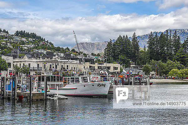 Queenstown pier and neighbouring mountain slopes; Queenstown  South Island  New Zealand