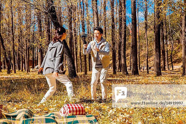 Young men and women in the outdoor camping