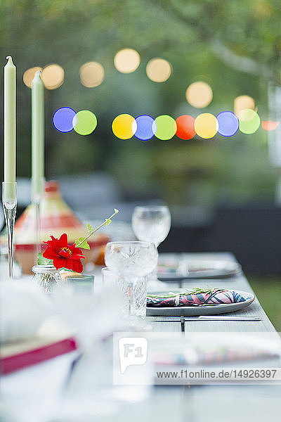 Placesettings on dinner garden party table
