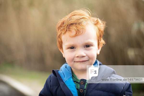 Portrait of boy with red hair